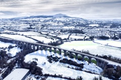 The 18 arches craigmore viaduct in the snow